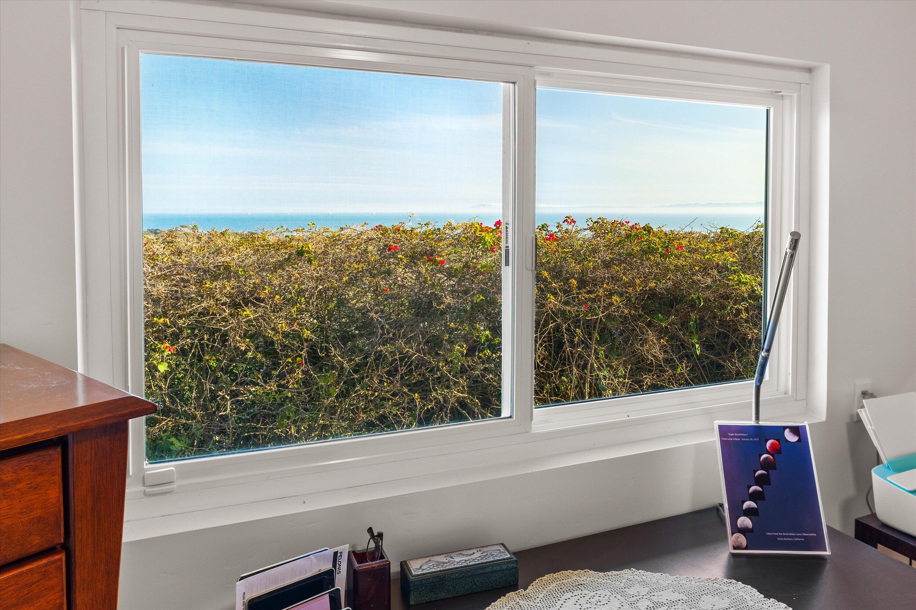 128 Las Alturas Road Santa Barbara, CA 93103 - Photo 31 of 36 a bathroom with a bathtub and a window