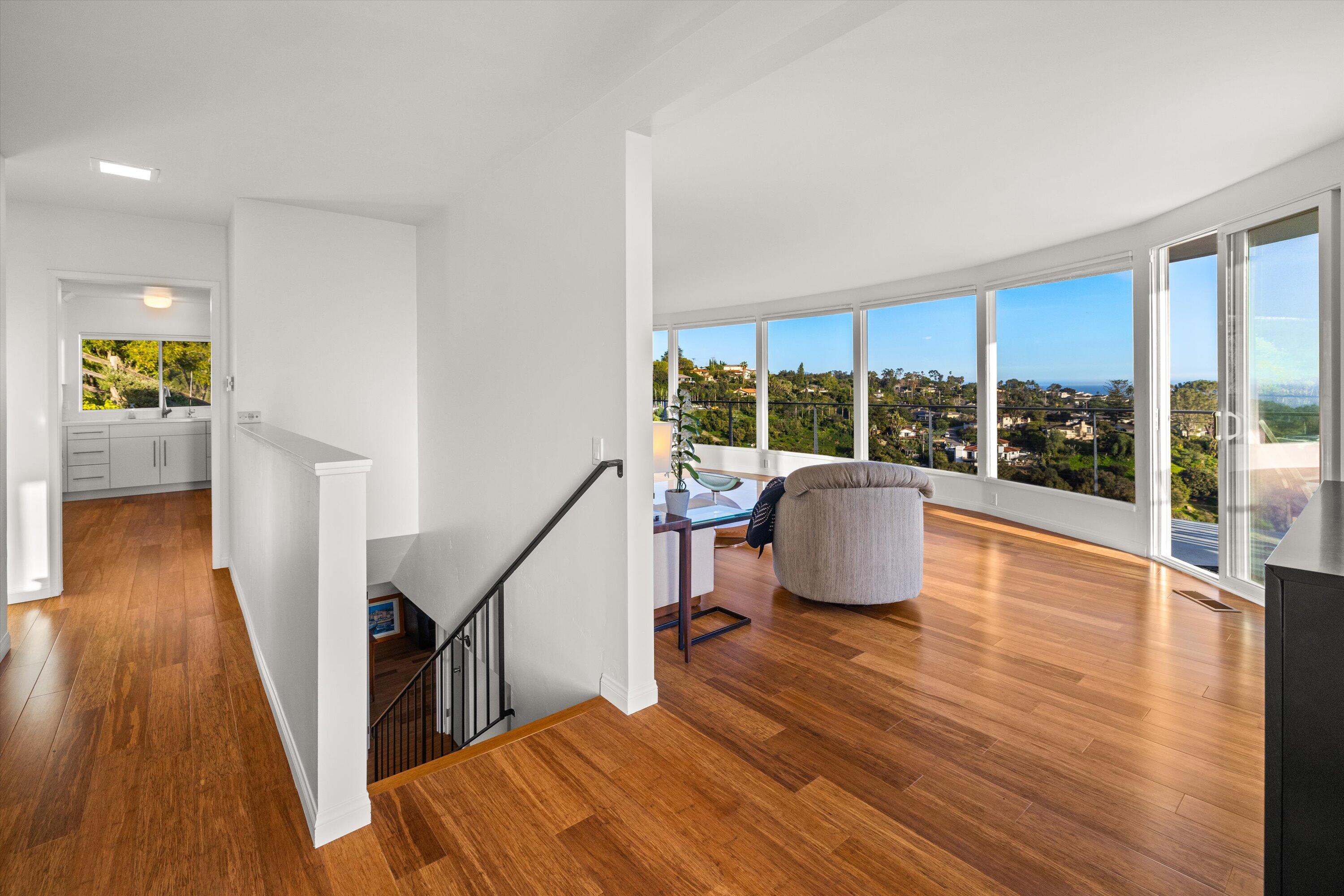 128 Las Alturas Road Santa Barbara, CA 93103 - Photo 5 of 36 a living room with furniture and a wooden floor