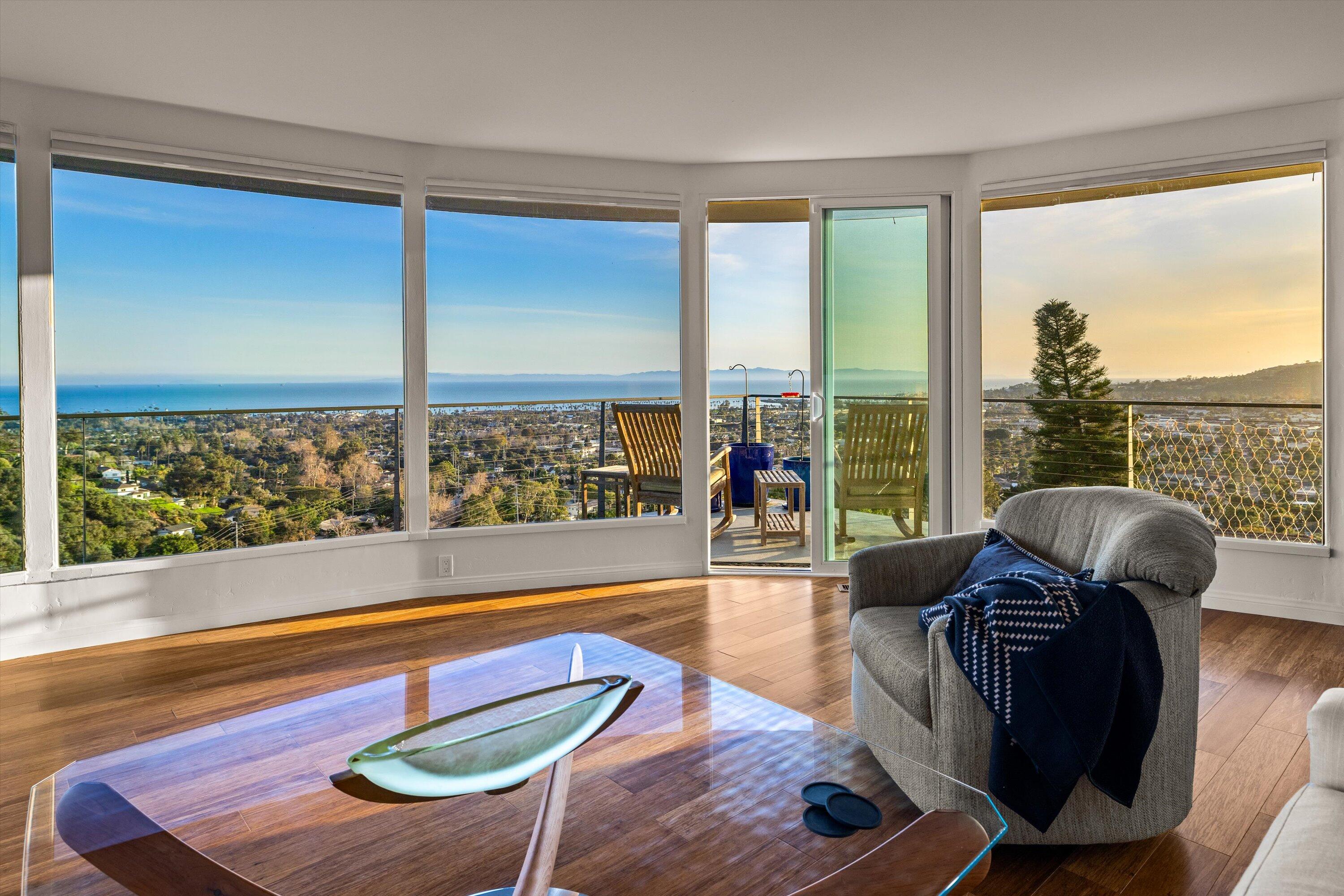 128 Las Alturas Road Santa Barbara, CA 93103 - Photo 6 of 36 a living room with patio furniture and a floor to ceiling window