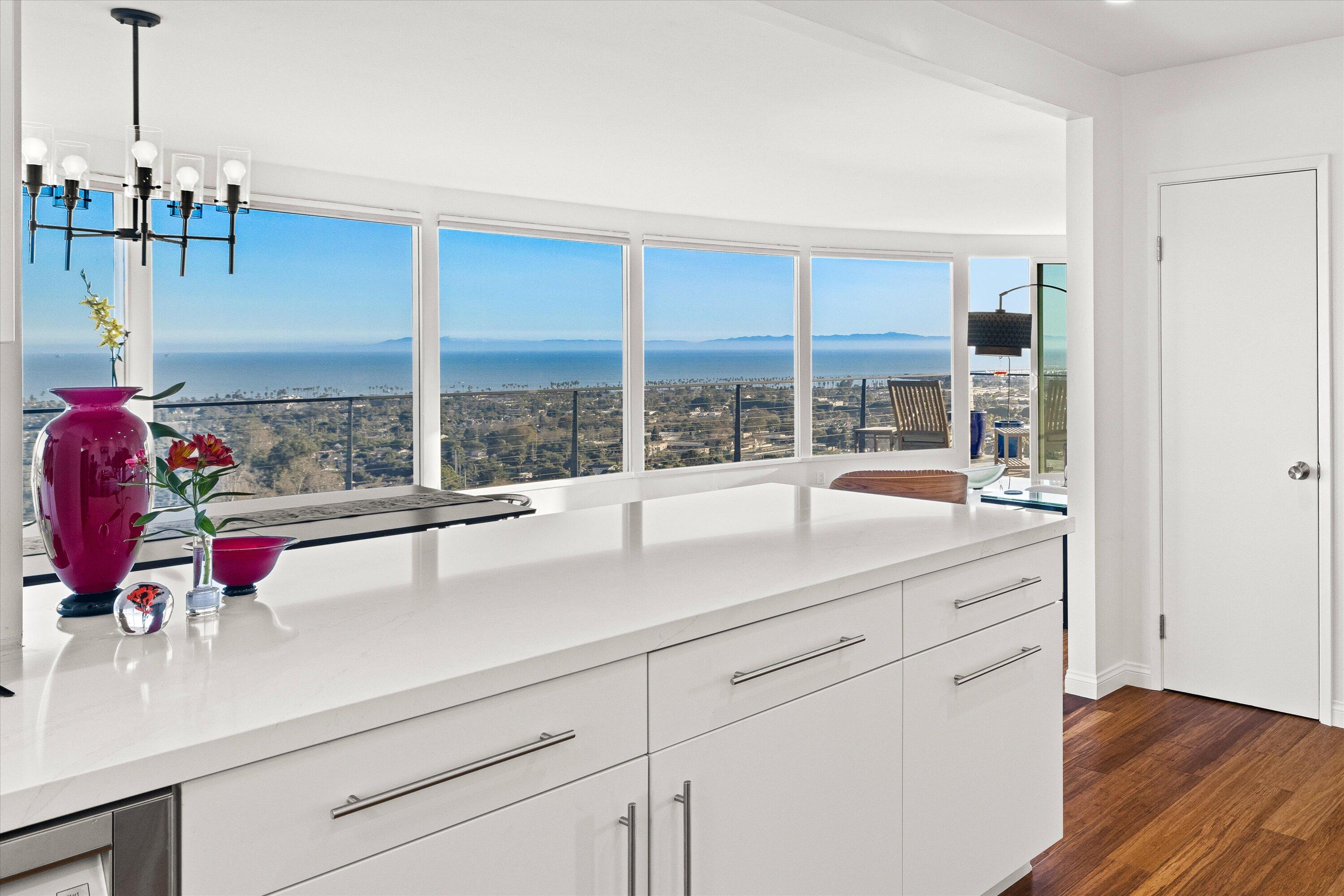 128 Las Alturas Road Santa Barbara, CA 93103 - Photo 8 of 36 a kitchen with a sink and large window