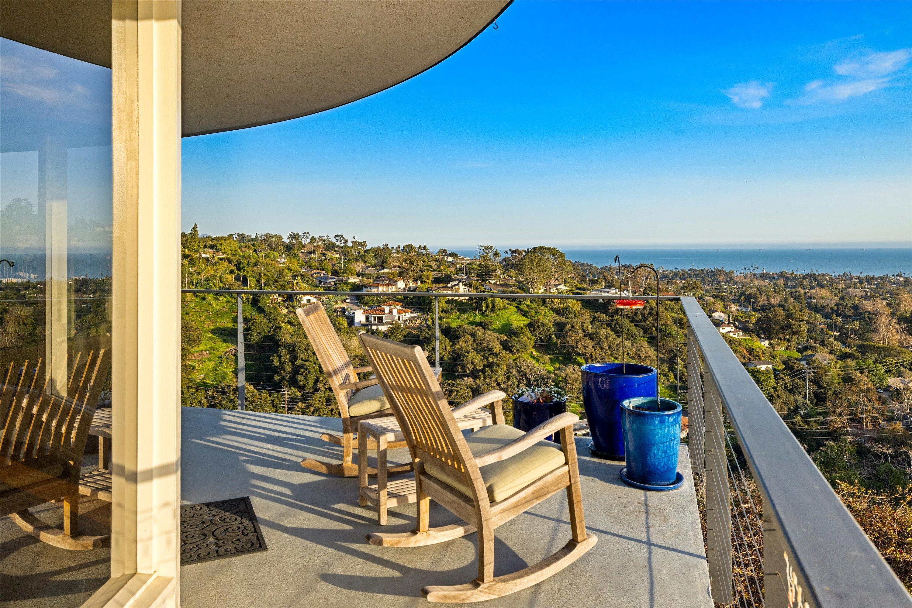 128 Las Alturas Road Santa Barbara, CA 93103 - Photo 10 of 36 a view of a balcony with an outdoor seating