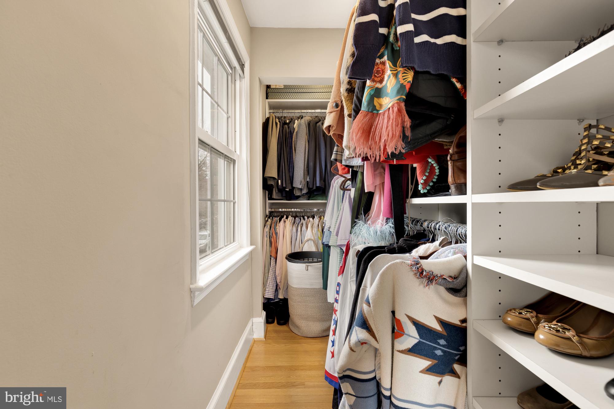 4109 17th Street Northwest Washington, DC 20011 - Photo 23 of 47 a view of walk in closet with clothes and shoes