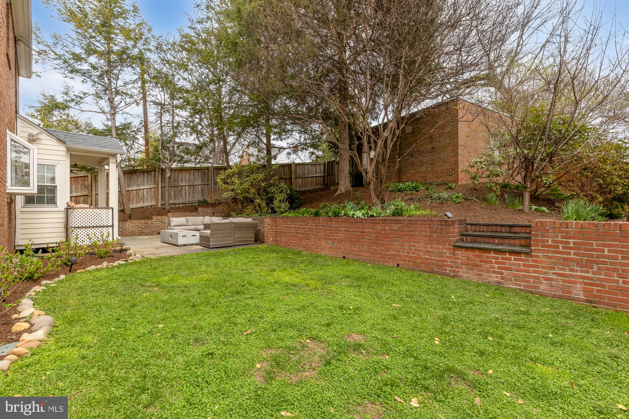 4109 17th Street Northwest Washington, DC 20011 - Photo 42 of 47 a backyard of a house with table and chairs