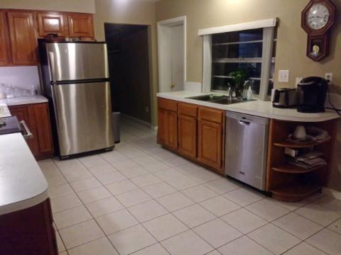 13301 Southwest 99th Place Miami, FL 33176 - Photo 2 of 11 a kitchen with stainless steel appliances a refrigerator and a stove