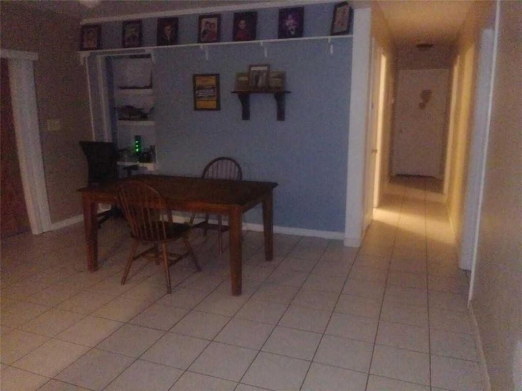 13301 Southwest 99th Place Miami, FL 33176 - Photo 4 of 11 a dining room with furniture and wooden floor