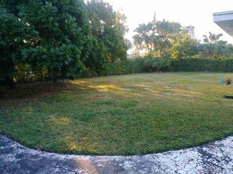 13301 Southwest 99th Place Miami, FL 33176 - Photo 9 of 11 a backyard of a house with lots of green space