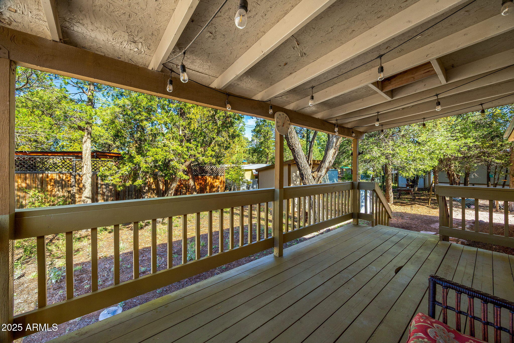2064 Pinewood Drive Overgaard, AZ 85933 - Photo 21 of 33 a view of a balcony with wooden floor