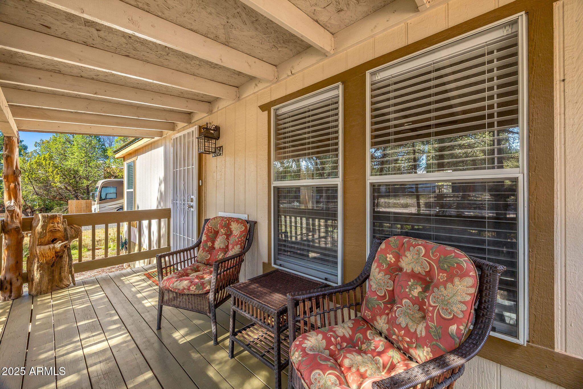 2064 Pinewood Drive Overgaard, AZ 85933 - Photo 3 of 33 a view of a balcony with furniture