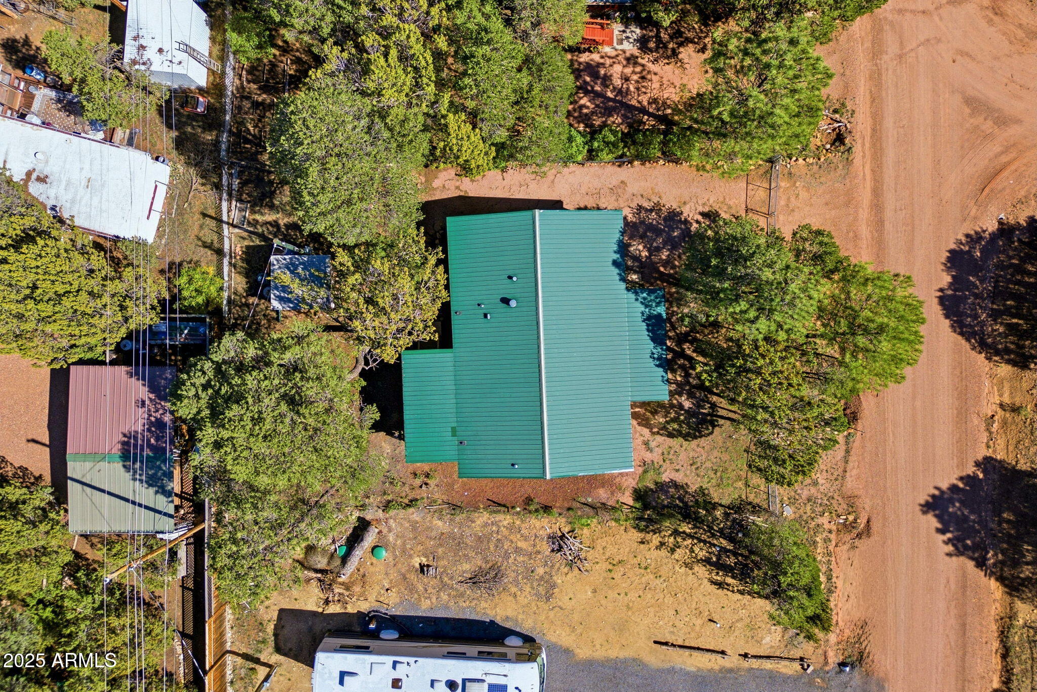 2064 Pinewood Drive Overgaard, AZ 85933 - Photo 31 of 33 an aerial view of a house