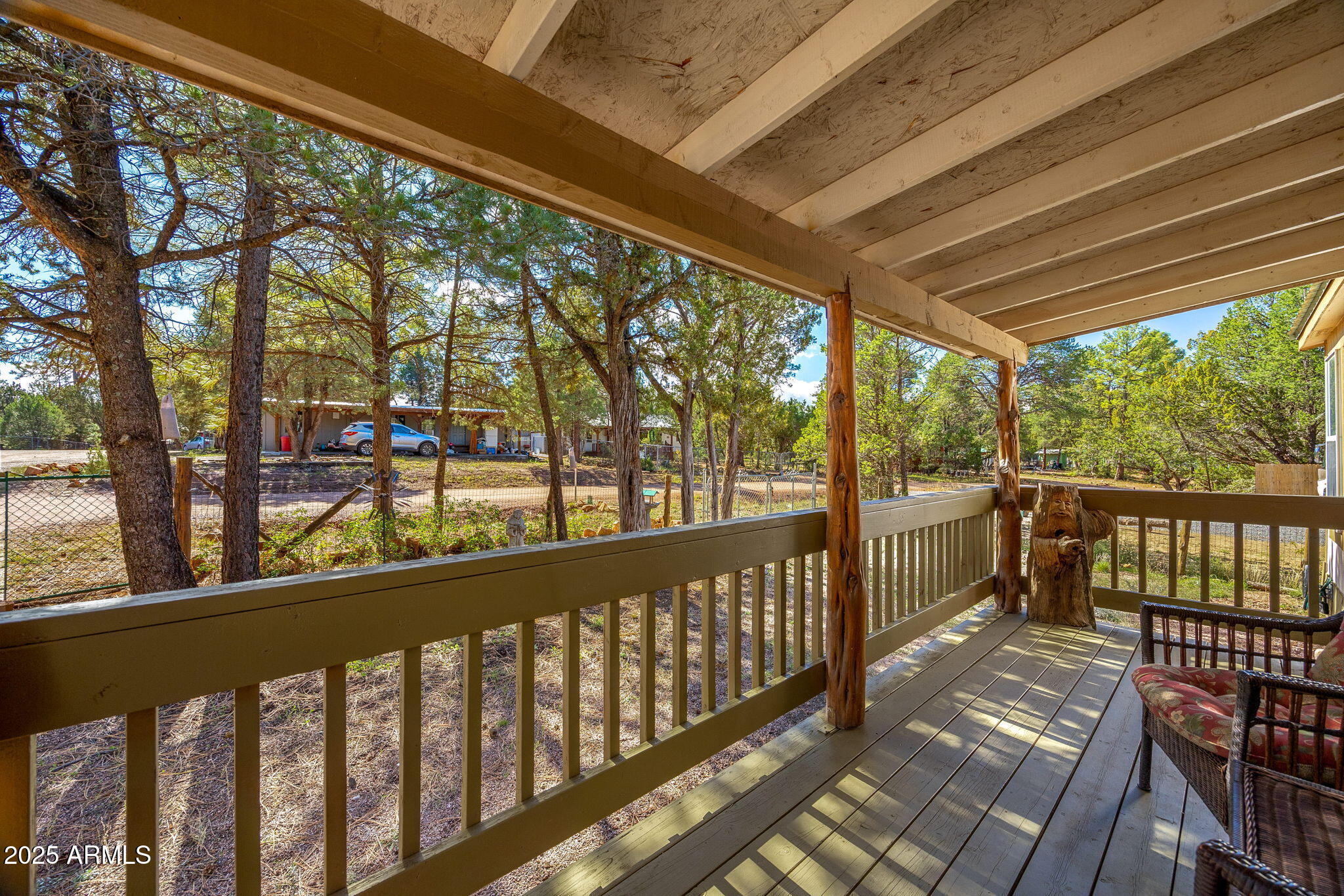2064 Pinewood Drive Overgaard, AZ 85933 - Photo 5 of 33 a view of a porch