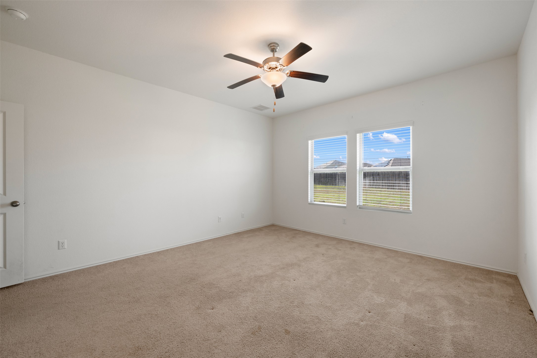 160 Copper Lane Kyle, TX 78640 - Photo 24 of 40 a view of an empty room with a window