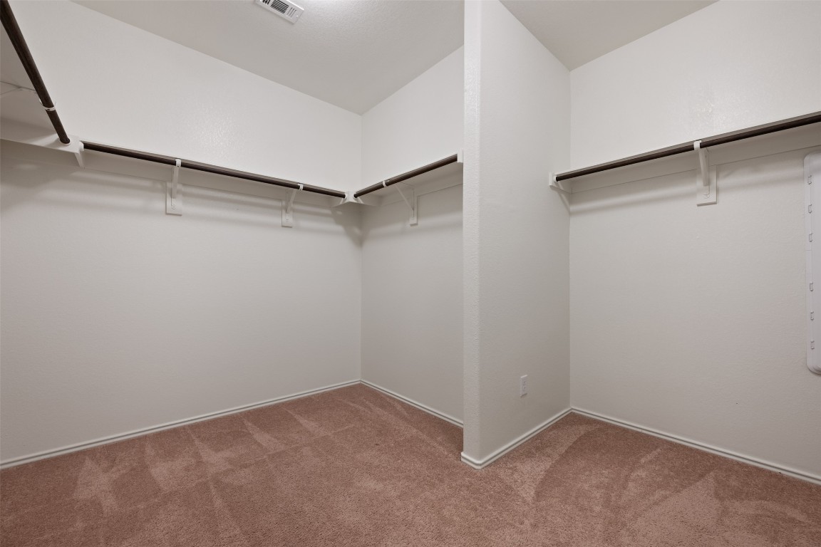 160 Copper Lane Kyle, TX 78640 - Photo 29 of 40 a view of an empty walk in closet