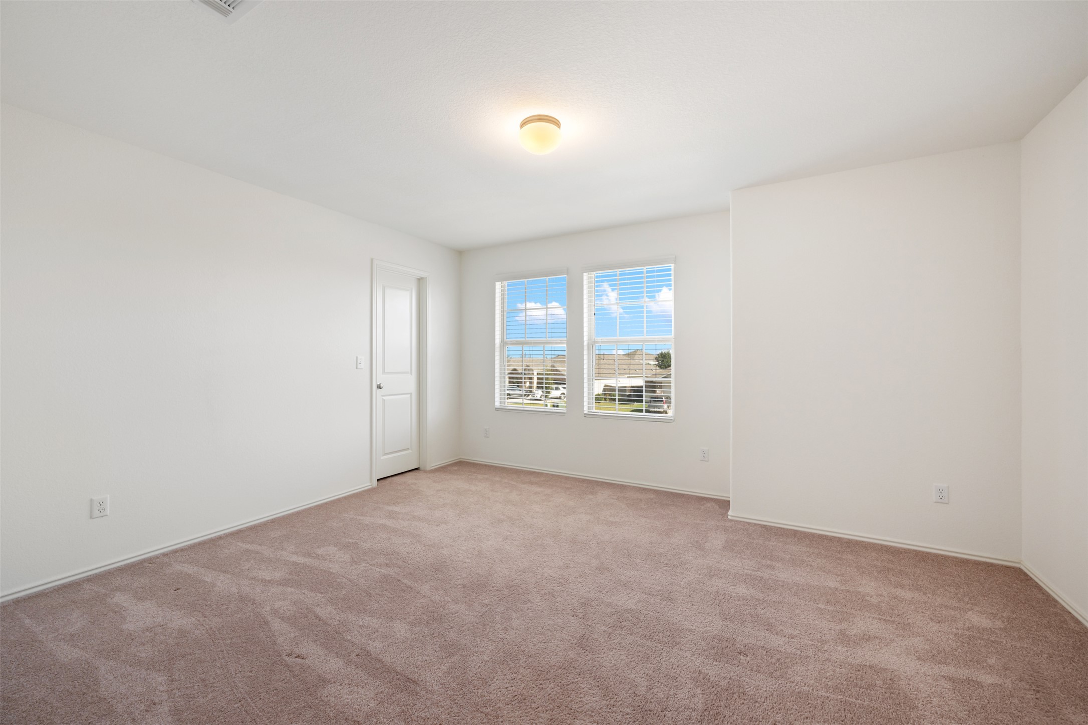 160 Copper Lane Kyle, TX 78640 - Photo 34 of 40 an empty room with windows