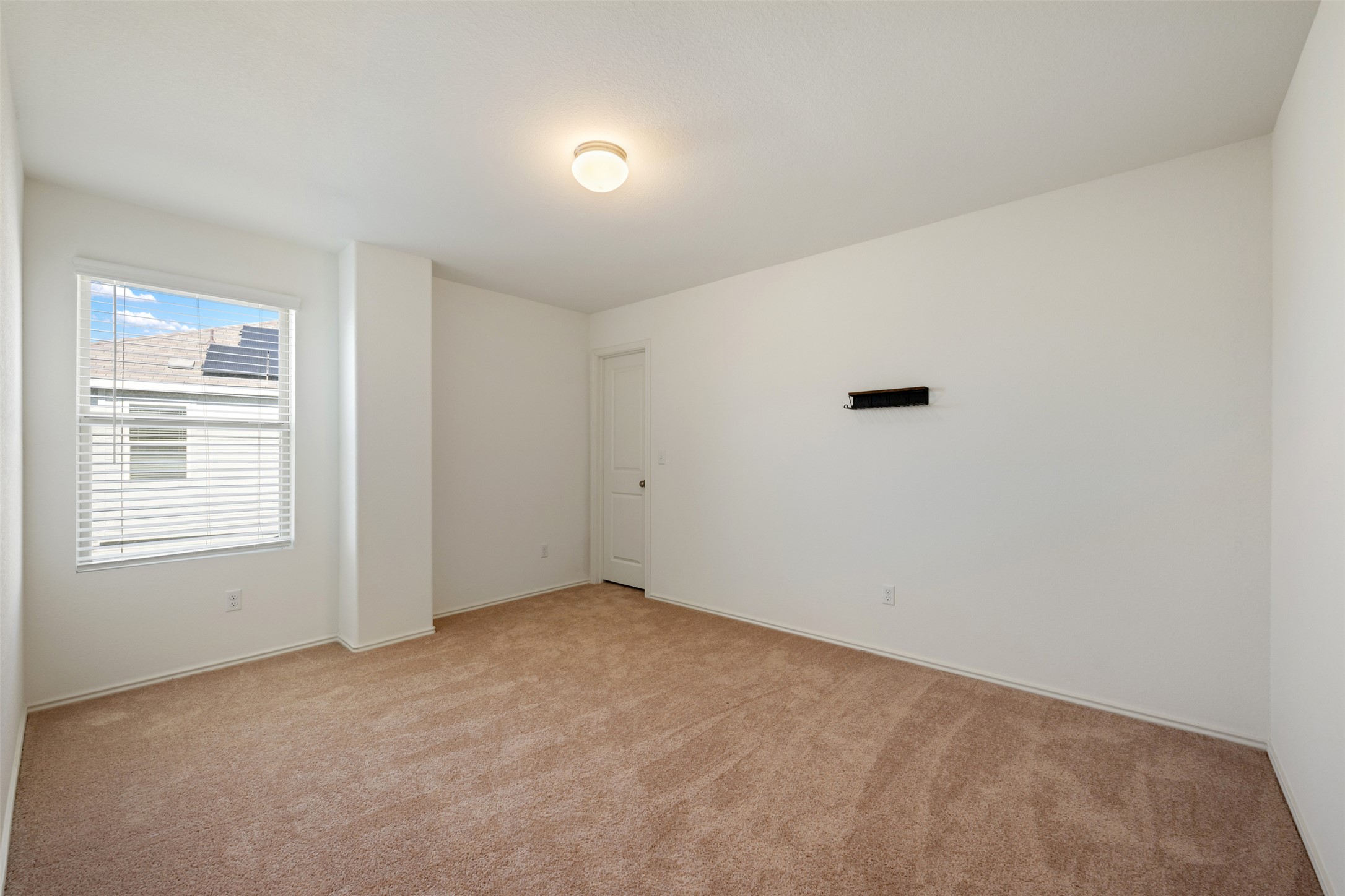160 Copper Lane Kyle, TX 78640 - Photo 35 of 40 a view of an empty room with a window