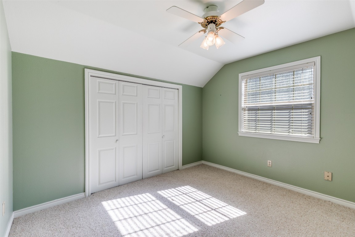 106 Redbud Drive Spicewood, TX 78669 - Photo 16 of 35 a view of an empty room with a window