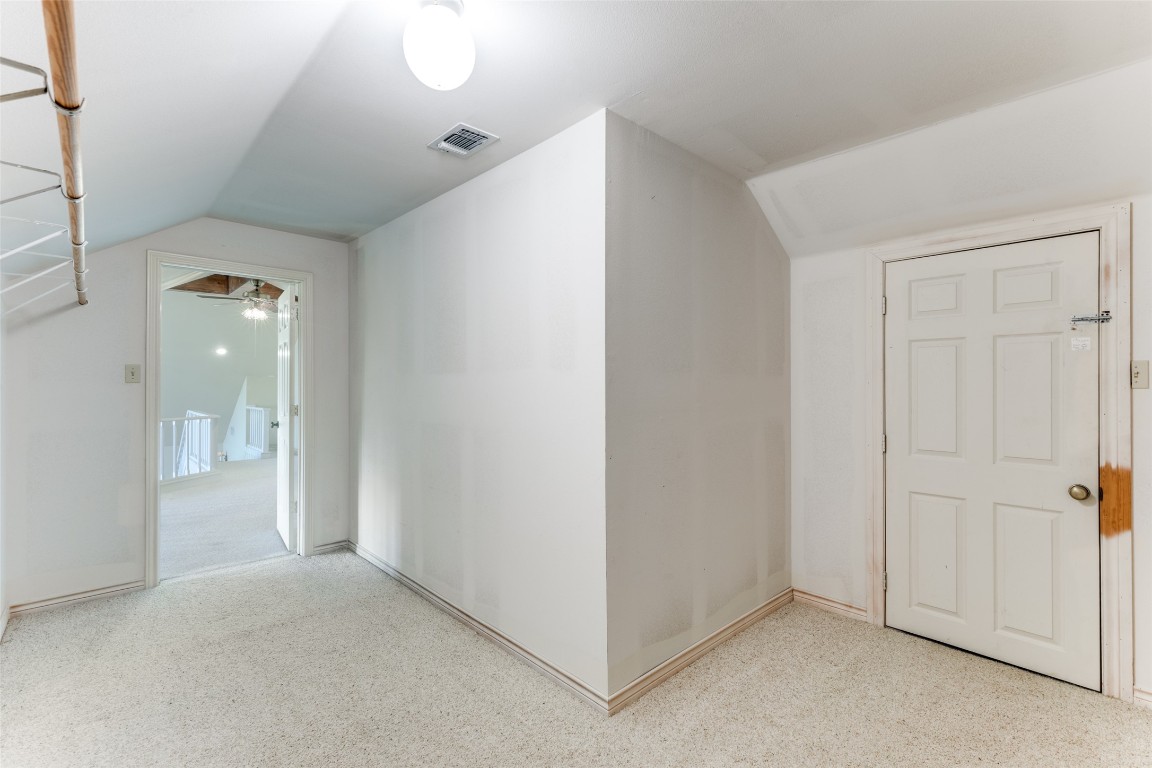106 Redbud Drive Spicewood, TX 78669 - Photo 20 of 35 an empty room with closet area