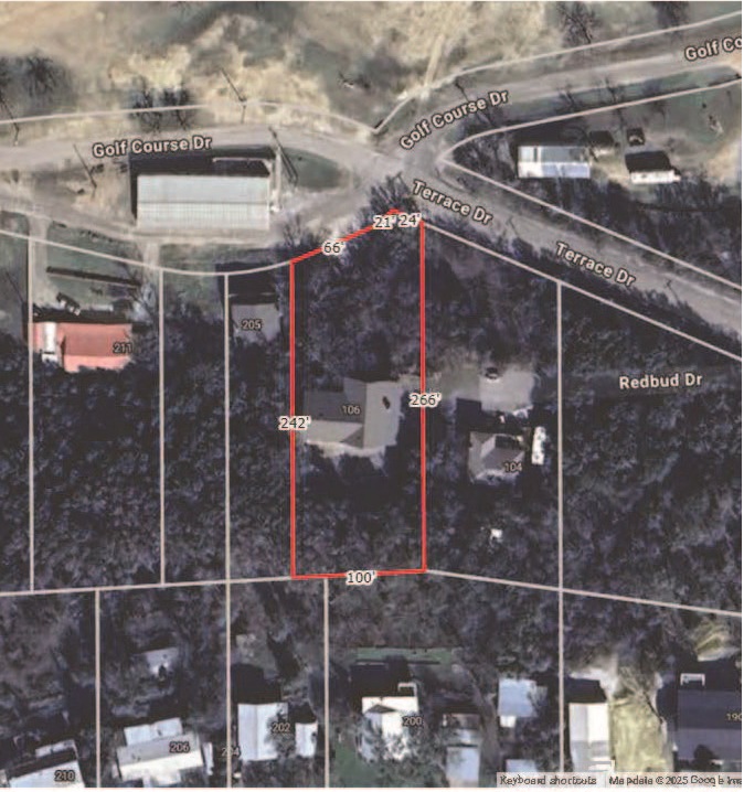 106 Redbud Drive Spicewood, TX 78669 - Photo 30 of 35 a bathroom with a glass shower door