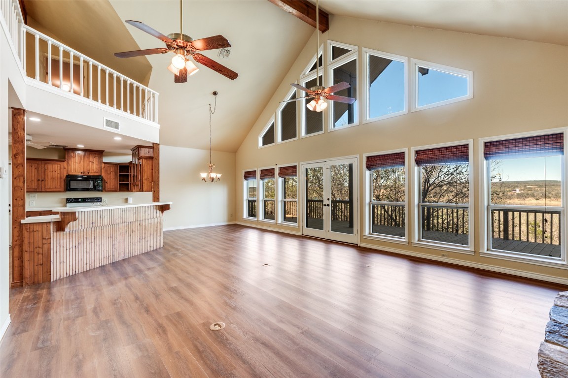 106 Redbud Drive Spicewood, TX 78669 - Photo 4 of 35 a view of an entryway with wooden floor