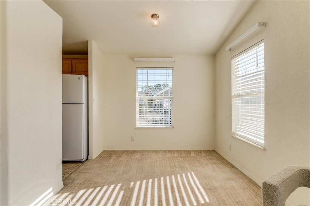 3210 Santa Maria Way, Unit 85 Santa Maria, CA 93455 - Photo 11 of 38 a view of an empty room with a window
