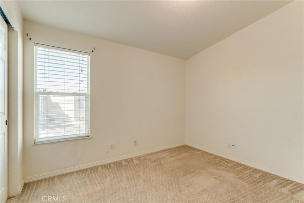 3210 Santa Maria Way, Unit 85 Santa Maria, CA 93455 - Photo 24 of 38 an empty room with a window