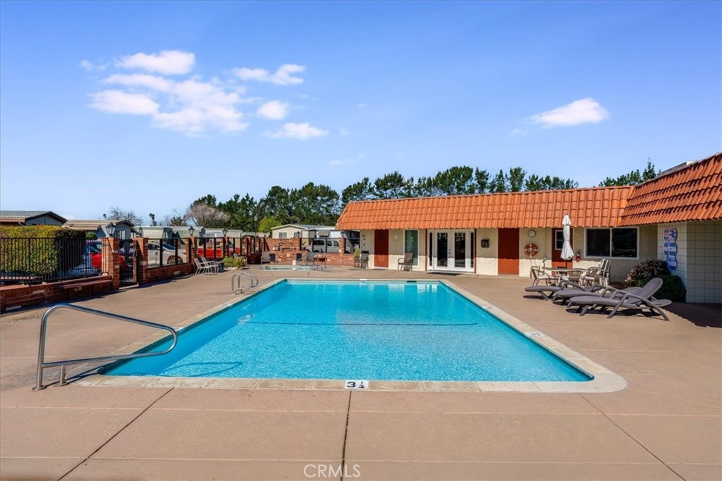 3210 Santa Maria Way, Unit 85 Santa Maria, CA 93455 - Photo 32 of 38 a view of house with outdoor space and swimming pool
