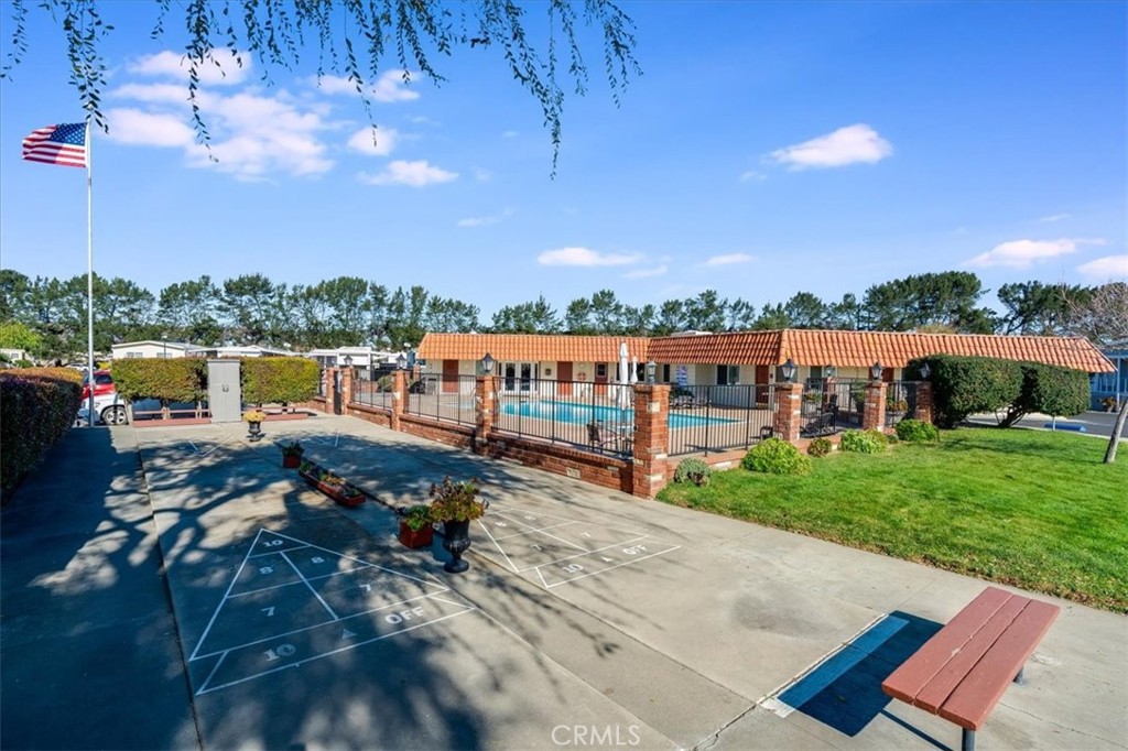 3210 Santa Maria Way, Unit 85 Santa Maria, CA 93455 - Photo 34 of 38 a view of swimming pool with outdoor seating and a garden