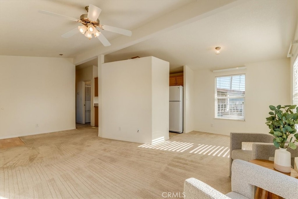 3210 Santa Maria Way, Unit 85 Santa Maria, CA 93455 - Photo 8 of 38 a view of livingroom with furniture window and wooden floor