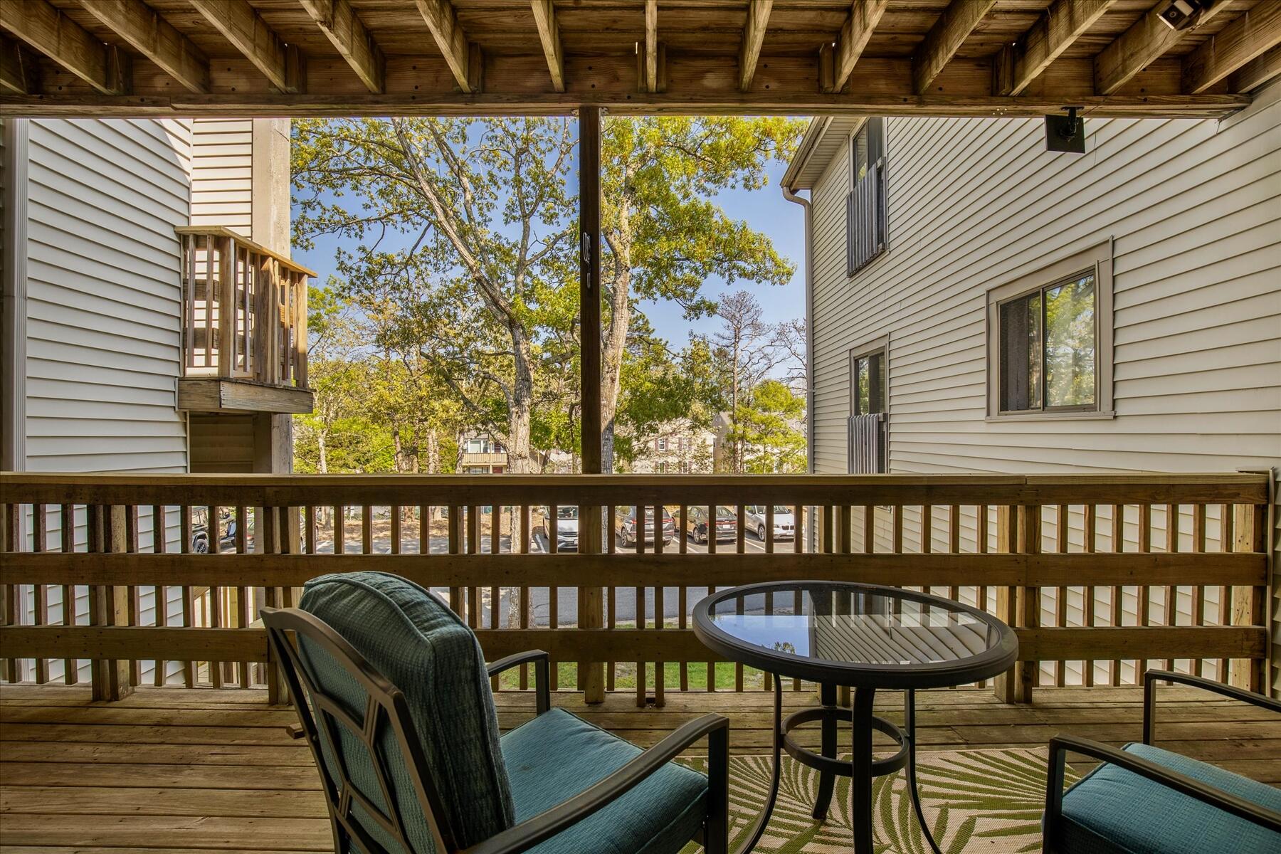 800 Bearses Way, Unit 1EB Hyannis, MA 02601 - Photo 2 of 37 a view of a balcony with chairs