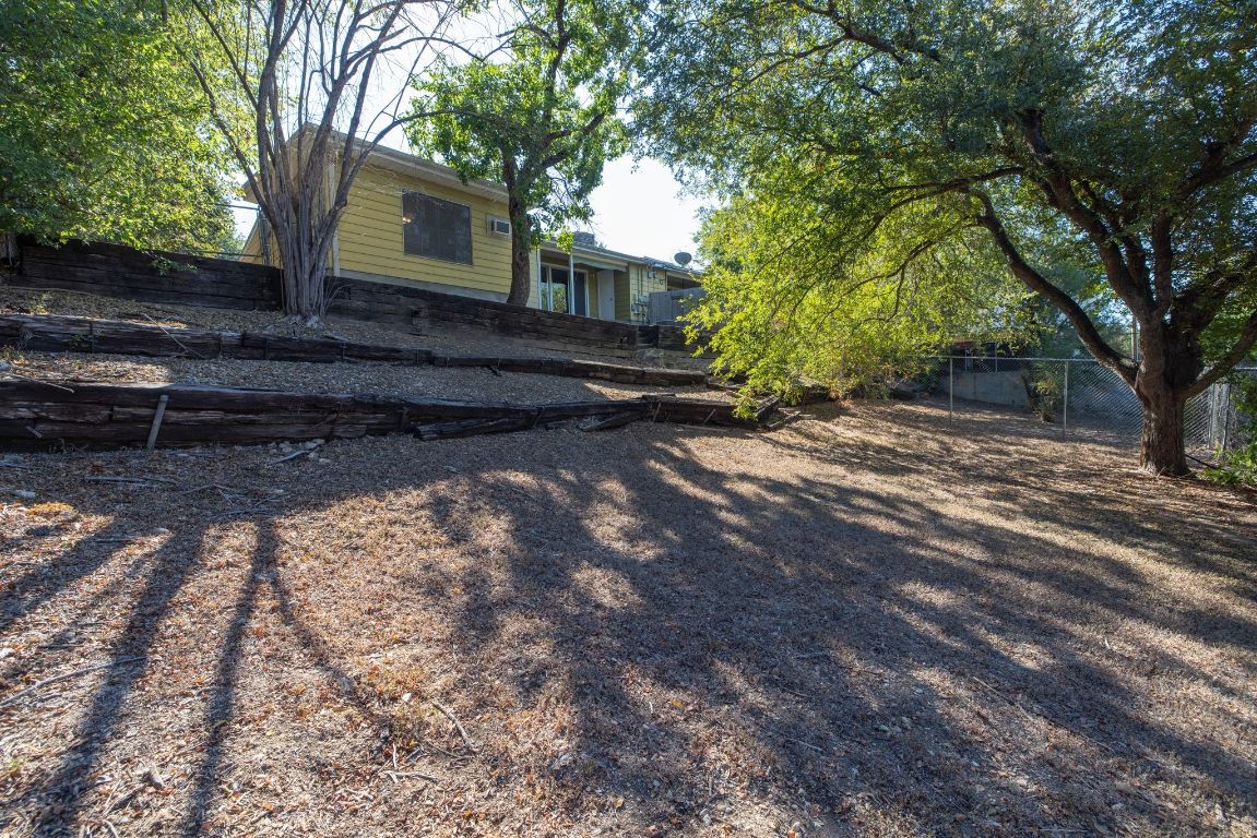 2326 Hartford Road Austin, TX 78703 - Photo 27 of 28 a view of a house with a yard