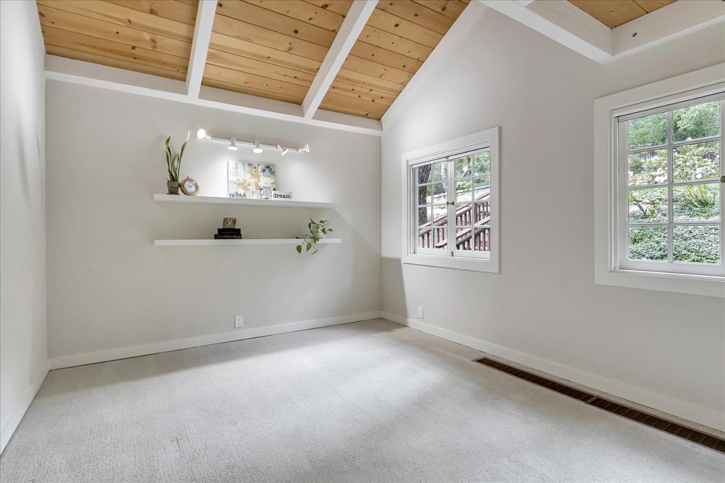 303 Midway Ranch Road Boulder Creek, CA 95006 - Photo 20 of 32 an empty room with windows