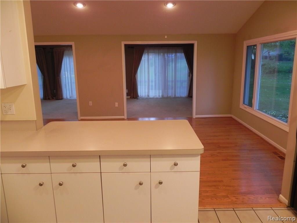 22601 Shadowpine Way Novi, MI 48375 - Photo 14 of 32 VIEW FROM KITCHEN TO DINING ROOM AND GREAT ROOM