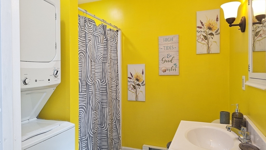 51 View Street Holyoke, MA 01040 - Photo 9 of 16 a bathroom with a sink and a bathtub