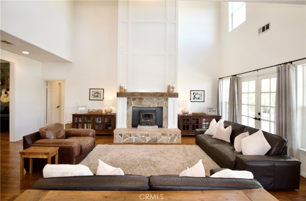 35159 El Dorado Road Lake Elsinore, CA 92530 - Photo 12 of 72 a living room with furniture and a fireplace
