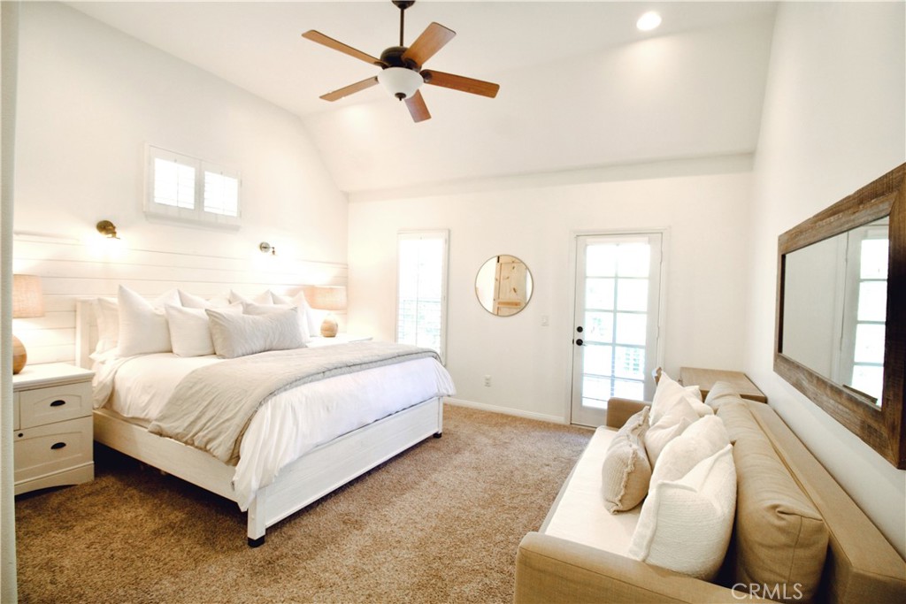 35159 El Dorado Road Lake Elsinore, CA 92530 - Photo 18 of 72 a spacious bedroom with a bed and window