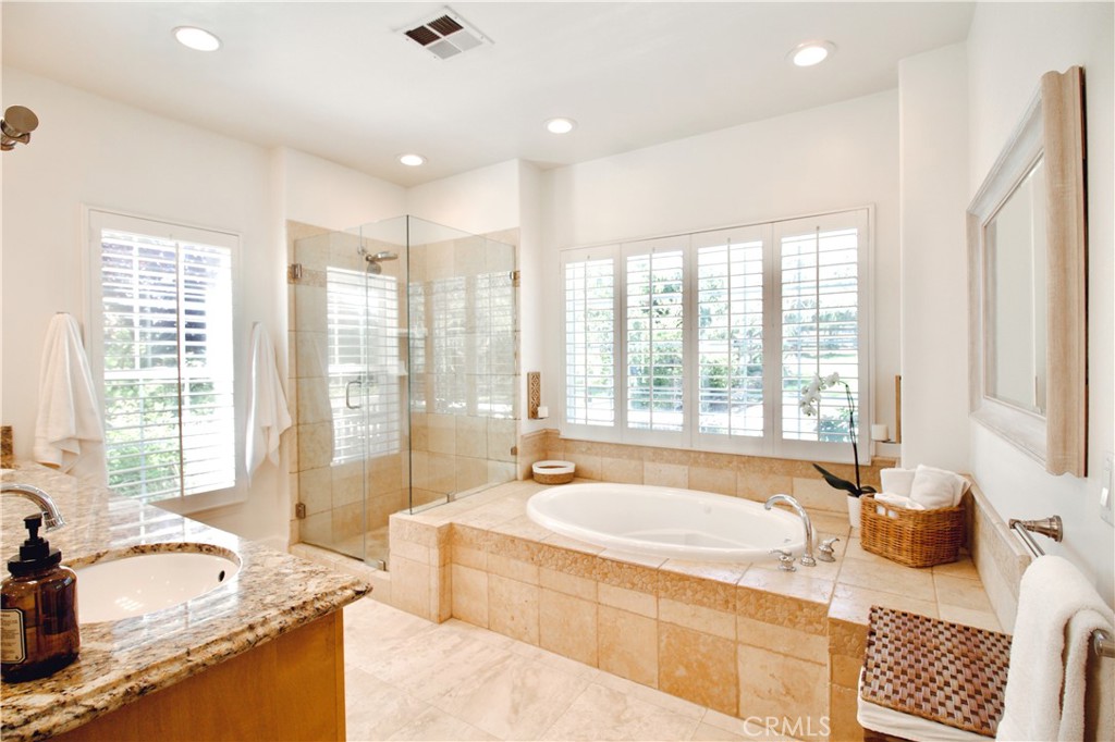 35159 El Dorado Road Lake Elsinore, CA 92530 - Photo 21 of 72 a spacious bathroom with sink tub shower and couch