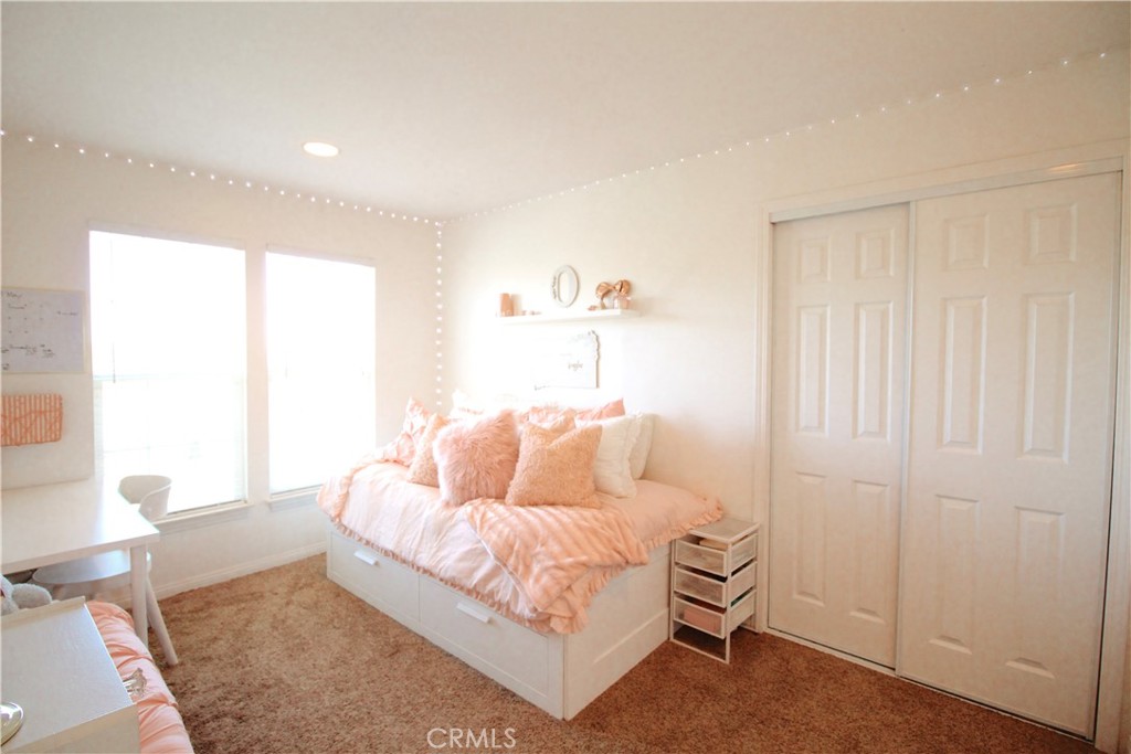 35159 El Dorado Road Lake Elsinore, CA 92530 - Photo 40 of 72 a living room with furniture and a window