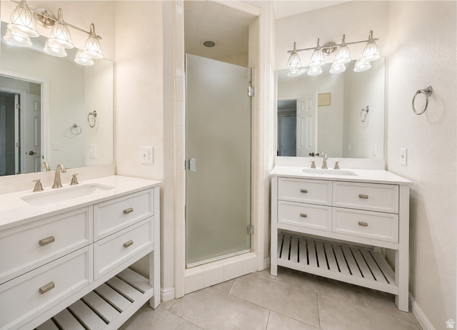 6907 South 745th Street East, Unit G Midvale, UT 84047 - Photo 13 of 30 Primary bathroom with dual vanities