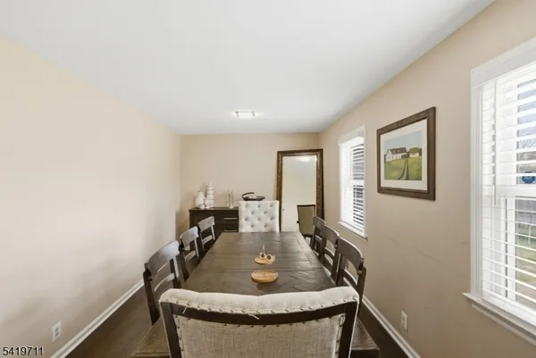 a dining room with table and chair