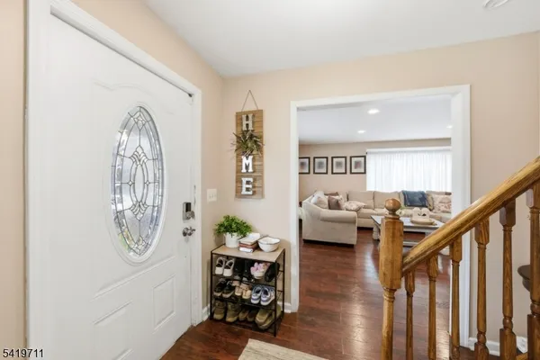 a view of entryway with wooden floor