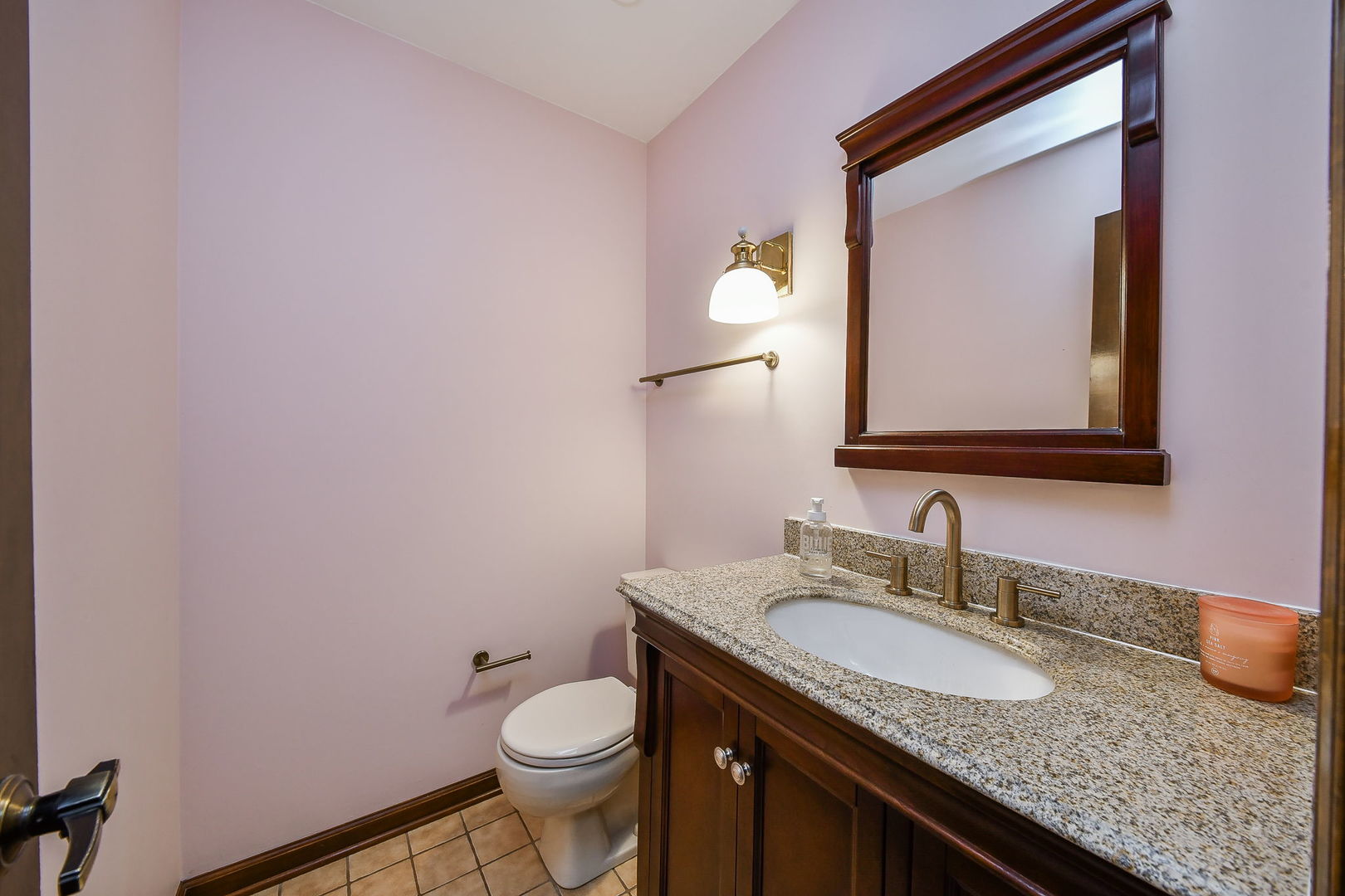 516 Cassin Road Naperville, IL 60565 - Photo 5 of 23 a bathroom with a granite countertop sink and a mirror