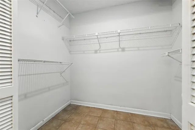 a view of a room with racks on the wall