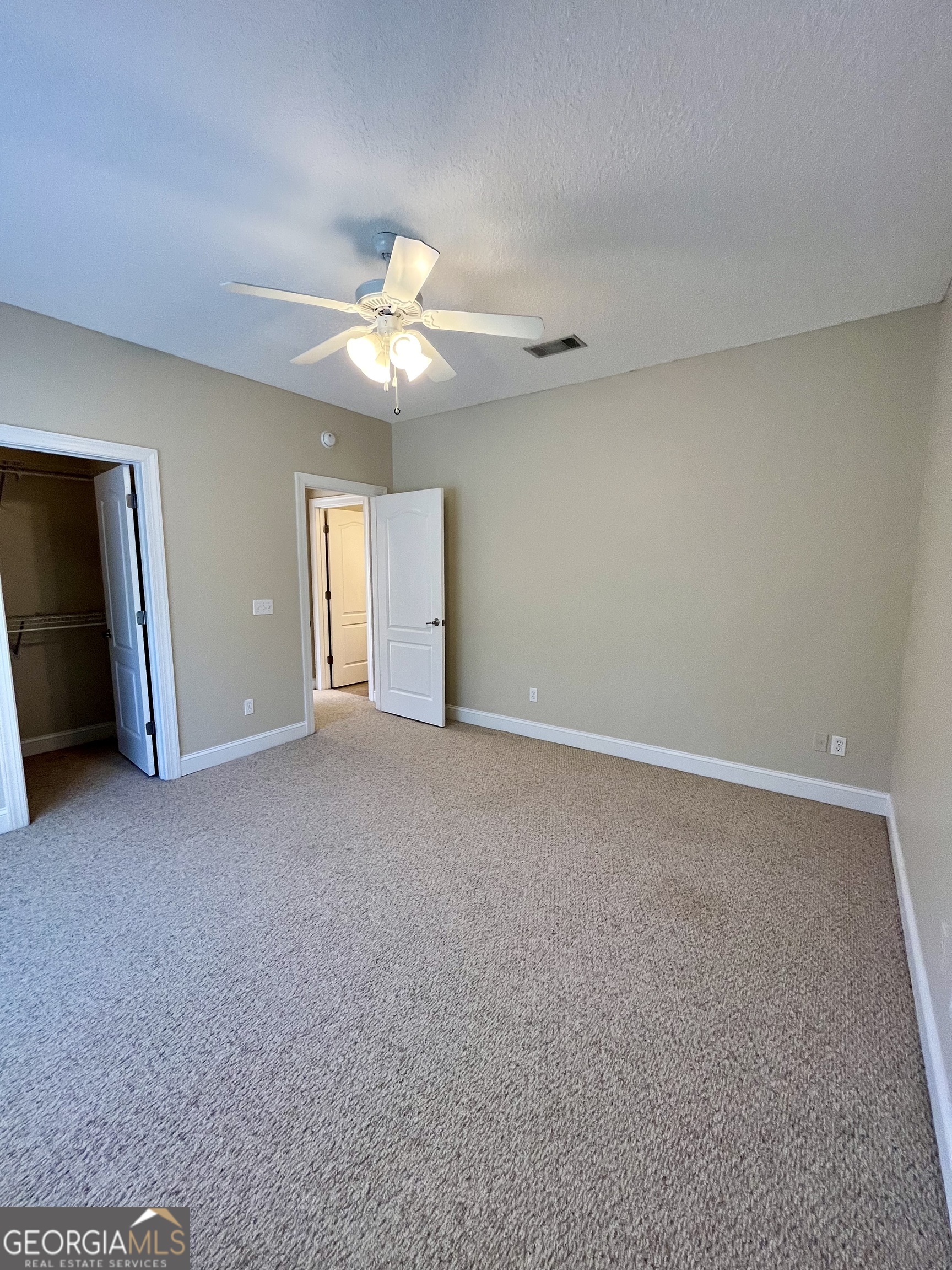 49 Coastal Walk St. Marys, GA 31558 - Photo 21 of 42 a view of an empty room with a window