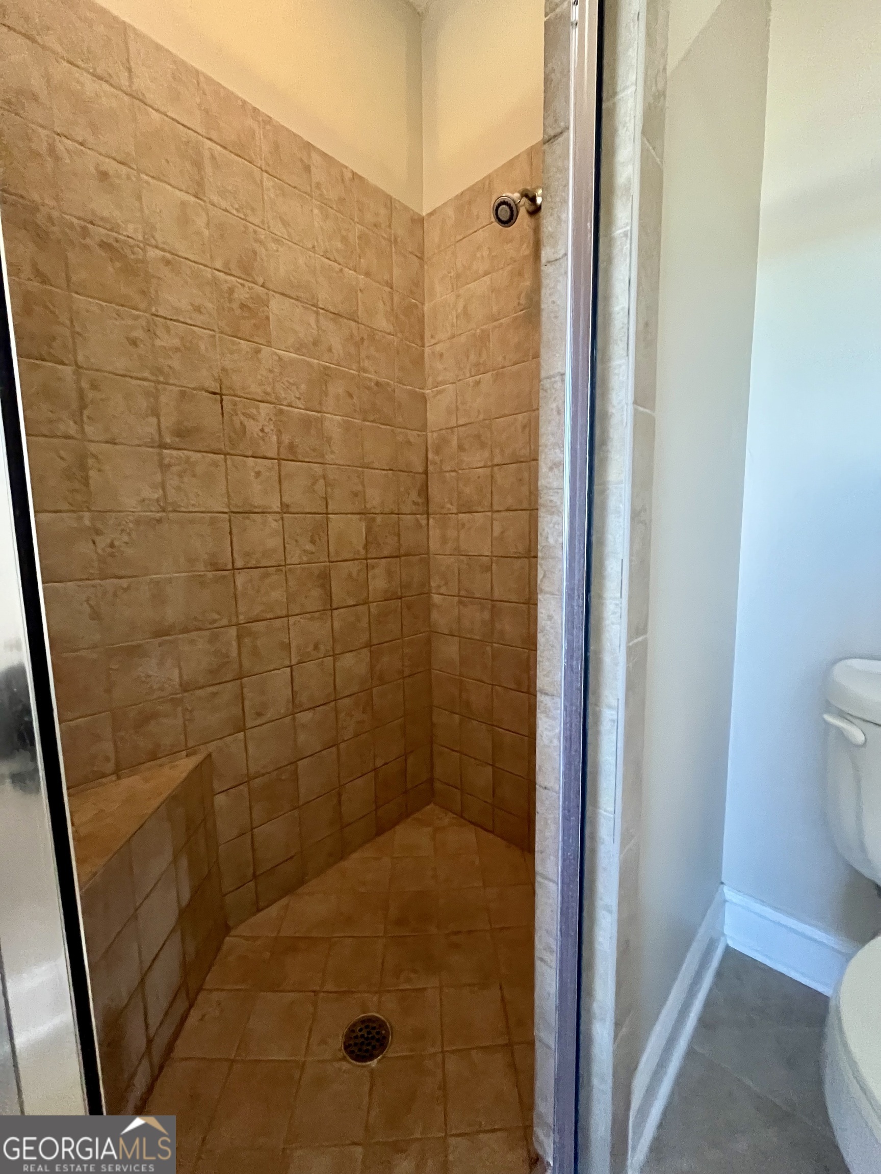 49 Coastal Walk St. Marys, GA 31558 - Photo 34 of 42 a bathroom with a shower and a toilet