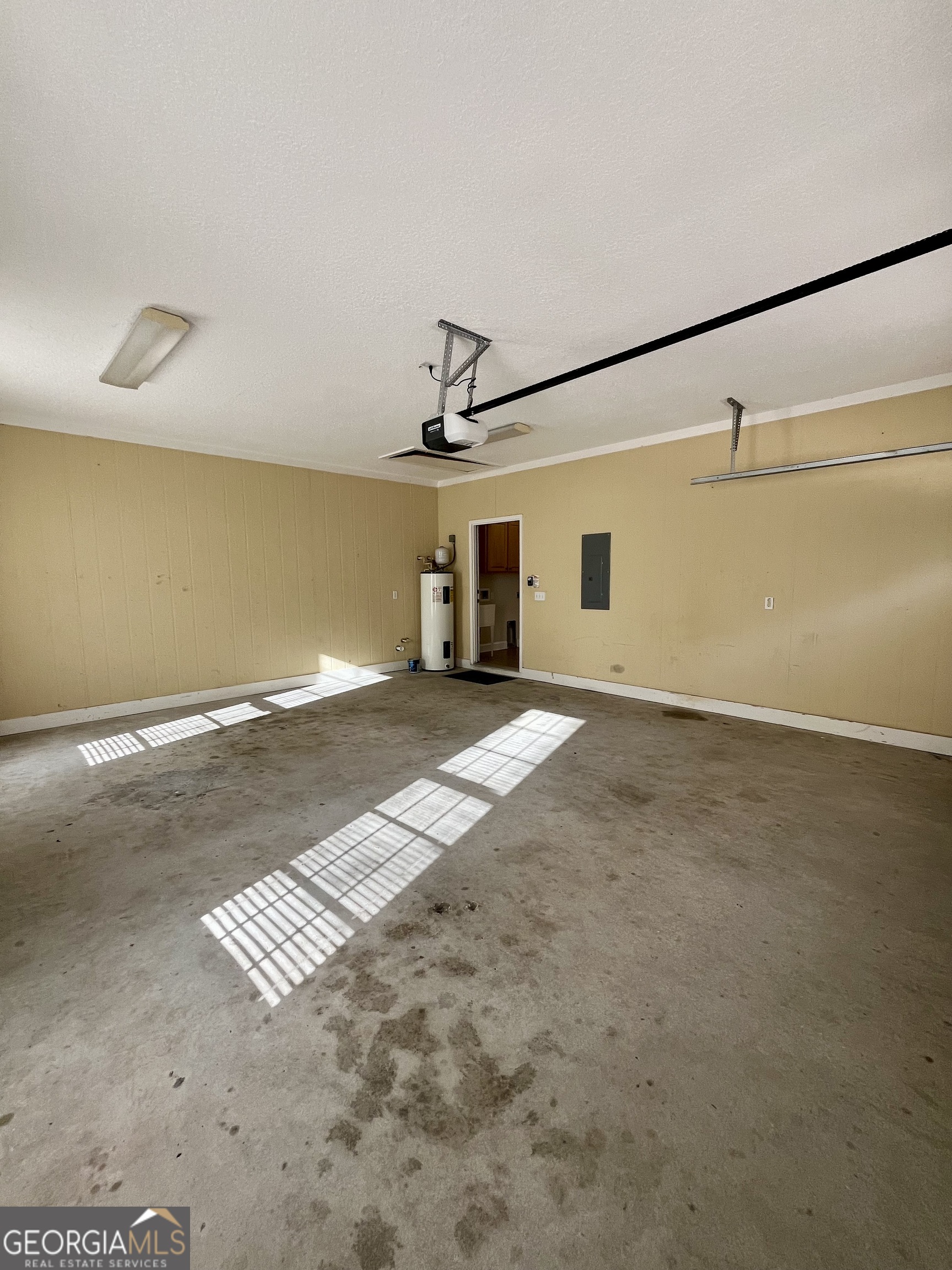 49 Coastal Walk St. Marys, GA 31558 - Photo 41 of 42 a view of a big room with wooden floor and windows