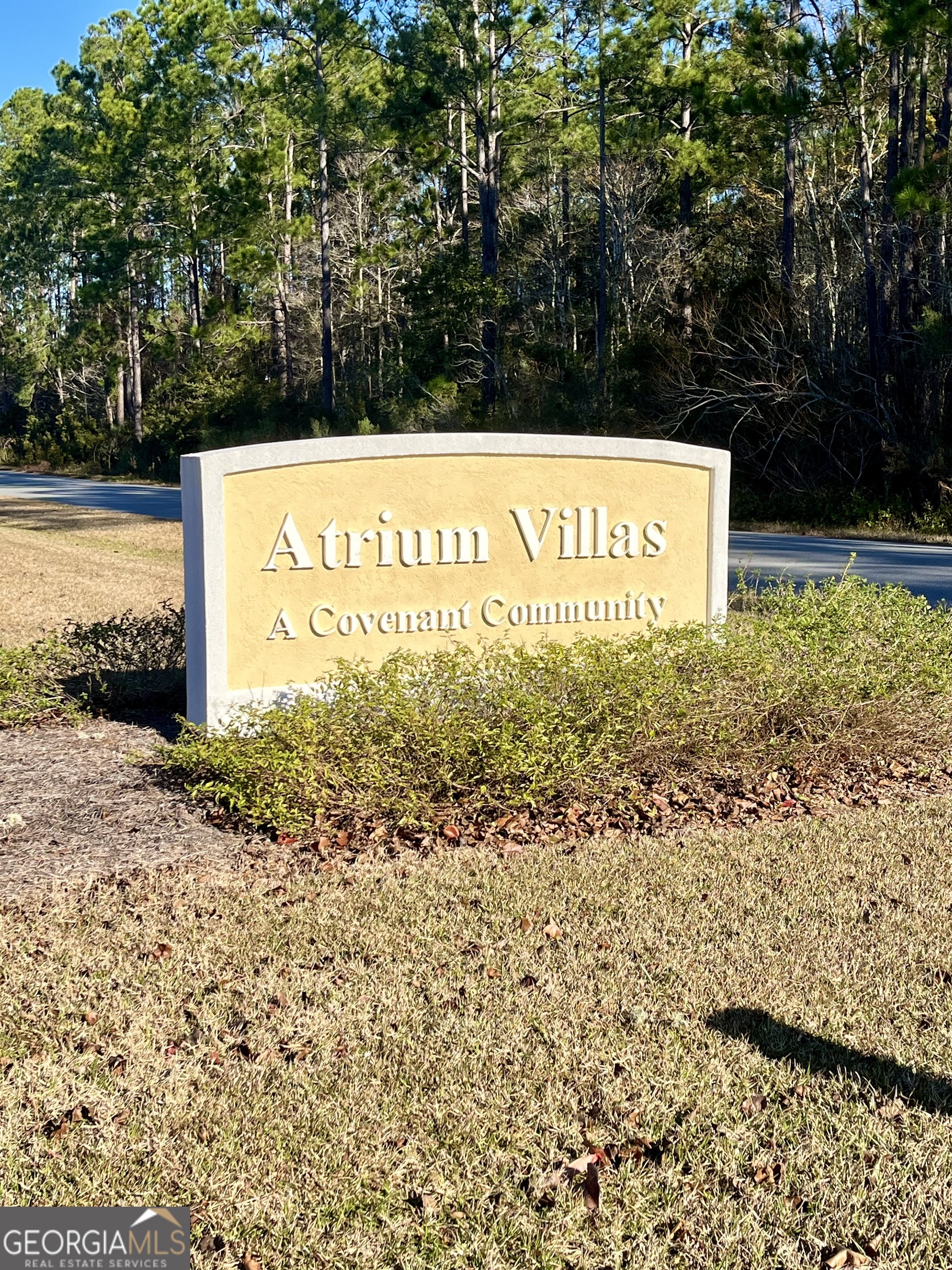 49 Coastal Walk St. Marys, GA 31558 - Photo 42 of 42 a sign broad on the side of the road