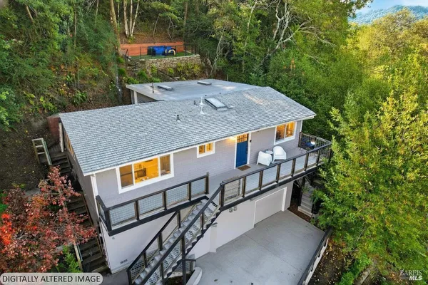 a view of a house with pool and yard