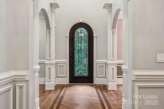 a view of front door with yard