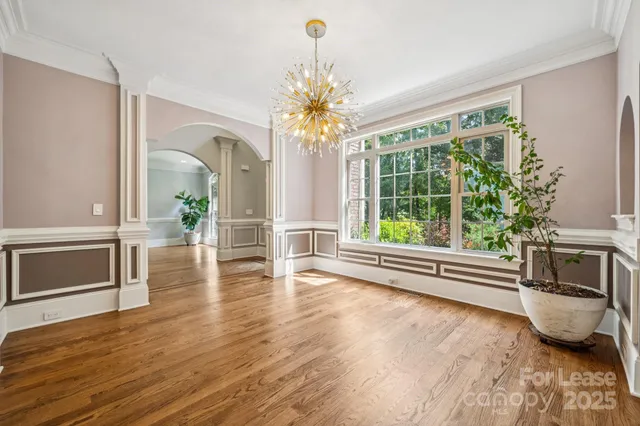 a view of living room with furniture and a fireplace