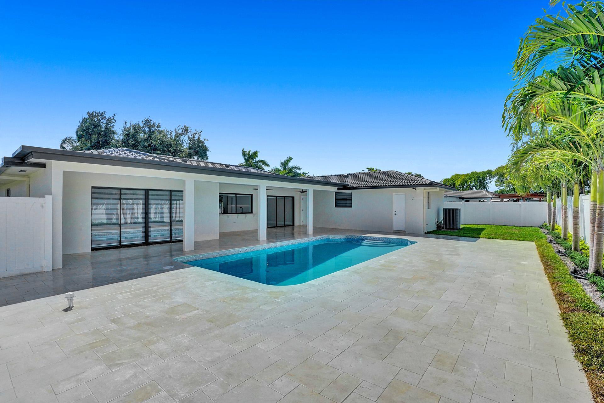 4951 Sarazen Drive Hollywood, FL 33021 - Photo 21 of 21 front view of a house with a patio