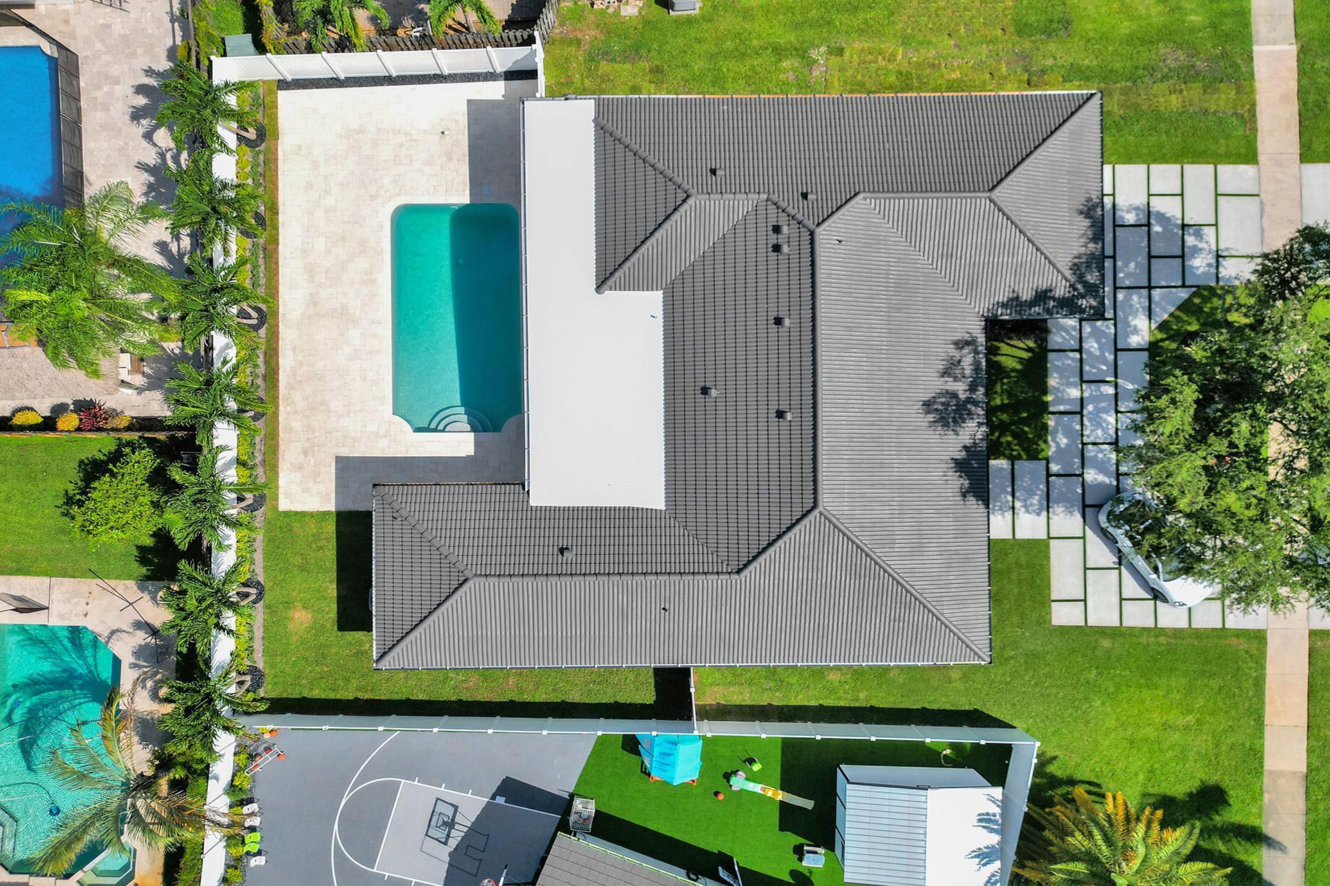 4951 Sarazen Drive Hollywood, FL 33021 - Photo 4 of 21 an aerial view of a house with garden space and street view